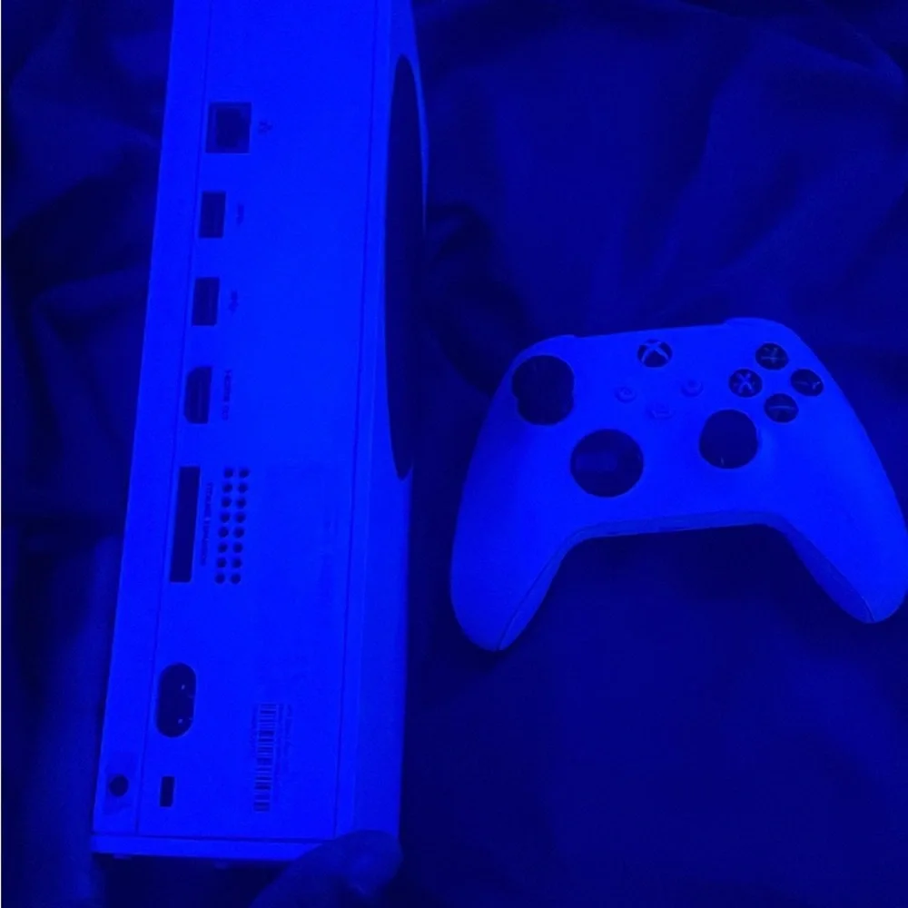 White Console with Black and Red Controller